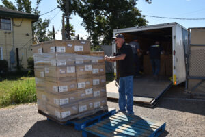 Hurricane Ian Relief Loading Trailer of supplies